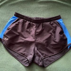 Under Armour running shorts WITH POCKETS